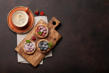 Set of cakes with berries