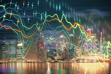 Obraz na płótnie Canvas Financial chart on city scape with tall buildings background multi exposure. Analysis concept.