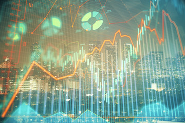 Financial graph on night city scape with tall buildings background multi exposure. Analysis concept.