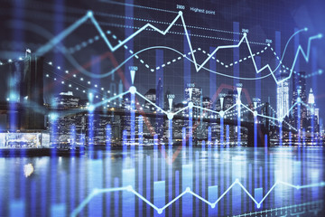 Financial graph on night city scape with tall buildings background multi exposure. Analysis concept.