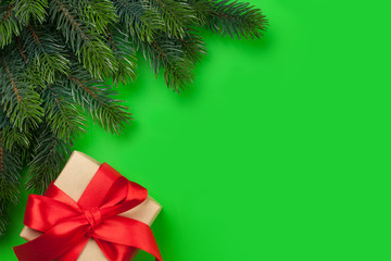 Christmas card with gift box and fir tree branch
