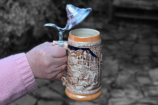 An Old Traditional Beer Mug With A Lid