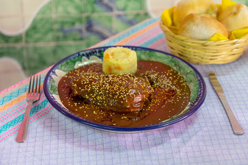 mole poblano with sesame seeds and rice soup,