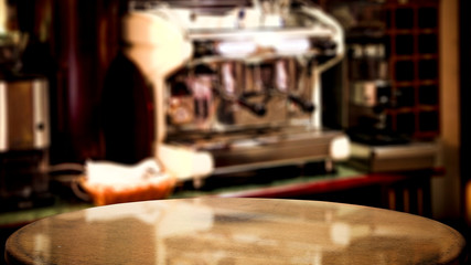 Wooden brown table of free space for your decoration and blurred background of bar. 