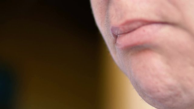 Close up of womans mouth smoking cigarrete