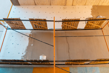 insulation, building repair and wall painting. scaffolding.