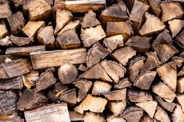 Stacked firewood background in a Bulgarian town
