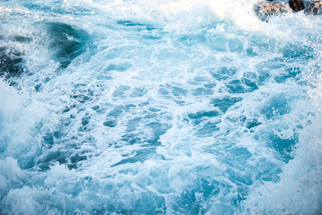 Blue raging waves foam of the Atlantic Ocean