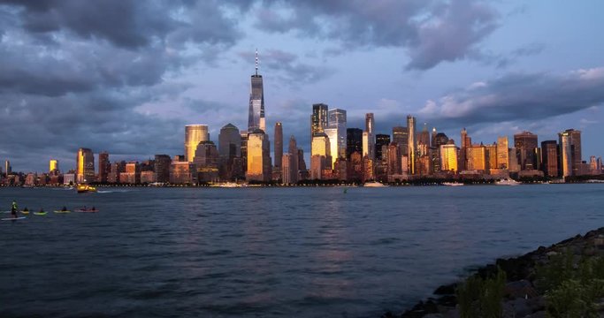 Manhattan skyline time lapse at sunset day to night transition. New York City view timelapse.