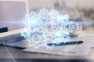 Double exposure of business theme icons and work space with computer background. Concept of success.