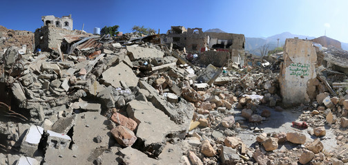 Piles of wrecked houses destroyed by war and fierce fighting between the national army and Al-Houthi militia in the east Taiz City .