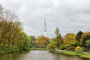 Fototapeta na wymiar April in Hamburg, park and TV tower, Germany