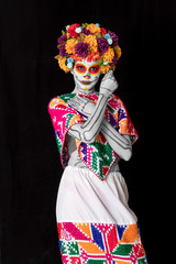 Obraz premium Catrina makeup. Young Mexican woman with typical costume.