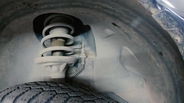 Car spring repait in a car service