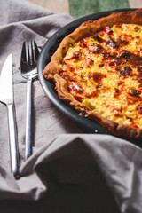 Vegetable Colorful Pie. Homemade quiche with chicken, goat cheese and spinach. Selective focus, vertical