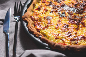 Vegetable Colorful Pie. Homemade quiche with chicken, goat cheese and spinach. Selective focus