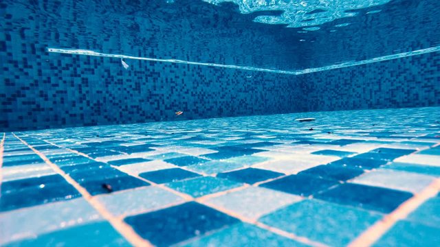 Dirt in the bottom of a pool