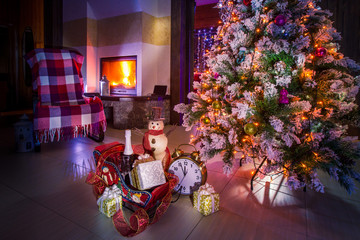 Christmas presents. Gifts from Santa Claus. New Year's atmosphere. The interior of the living room in the new year. Christmas Eve. gifts are under the Christmas tree. Waiting for Nativity.