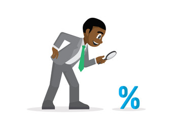 African Businessman verify at a small percent sign through a magnifying glass.