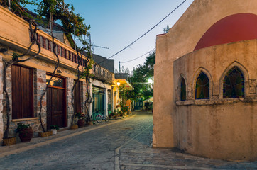 Fototapeta premium Central square of a traditional cretan village. Church, kafenio, mini market and narrow alleys, the main elements that exist in every cretan village. Crete Greece