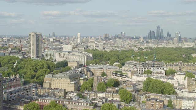 Aerial establishing shot of London on a sunny afternoon