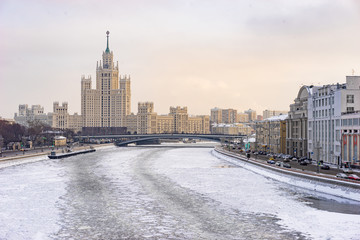 Russia. Moscow river in the winter. Kotelnicheskaya embankment. Traveling in snowy Moscow. Russian architecture. Panorama of winter Moscow. The capital of Russia in the winter. Guide to the Russia.