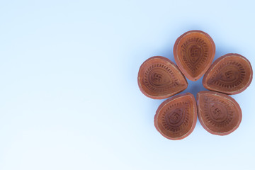 Indian festival Diwali, Diya oil lamps lit on colorful rangoli. Hindu traditional. Happy Deepavali.