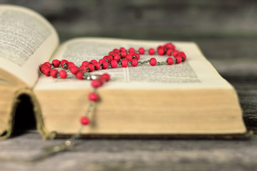 Rosary beads and holly bible