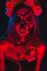 Creepy devil woman looking at camera