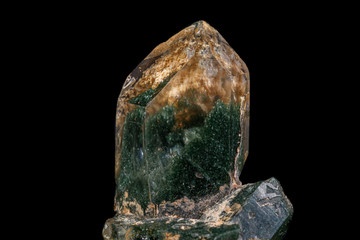 macro Axinite mineral stone on a black background