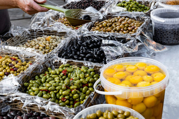 Marinated stuffed olives sold in the market.