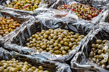 Marinated stuffed olives sold in the market.