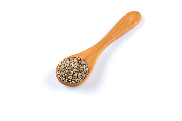 Cannabis Hemp seeds in spoon on white