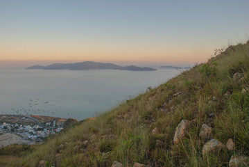 Fototapeta premium Sunset over Nha Trang city, Vietnam 