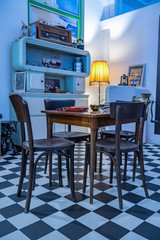 Old style living room interior - table and chairs in a room