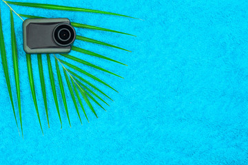 Action camera fern lie on a towel