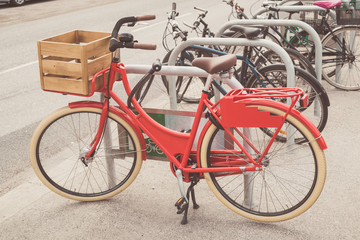 Fototapeta na wymiar Fashionable vintage modern bicycle parked on the street.