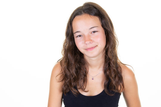 portrait of young beautiful caucasian teen girl in black shirt smiling looking camera isolated on white background