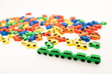 mini toy rubber cars on white background