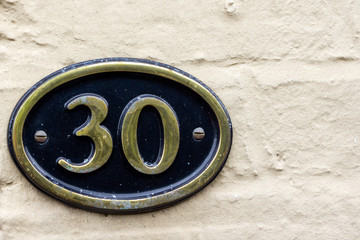 Oval house number 30