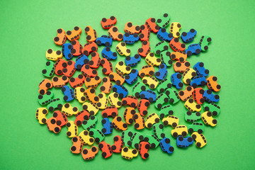 mini toy rubber cars on green background