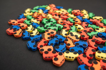 mini toy rubber cars on black background