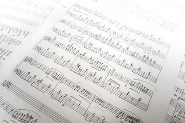 Sheet music with manual inscriptions close up