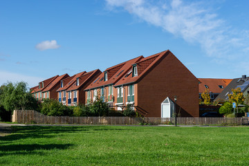 Fototapeta premium residential area with townhouses at a sunny day