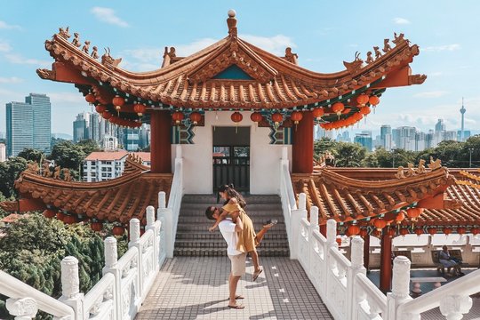 Man carrying woman outside