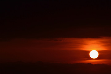 dawn sunrise spreading hues of orange in the sky