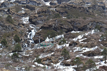 Statue of Lord Shiva in the snowy mountains of Himalaya