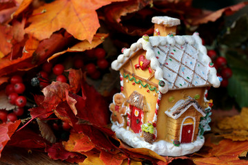 christmas gingerbread cookies and decorations with dolls and autumn leaves 