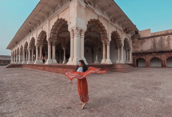 Woman standing outside temple