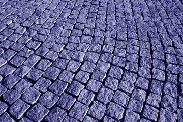 Stone pavement texture in blue tone.